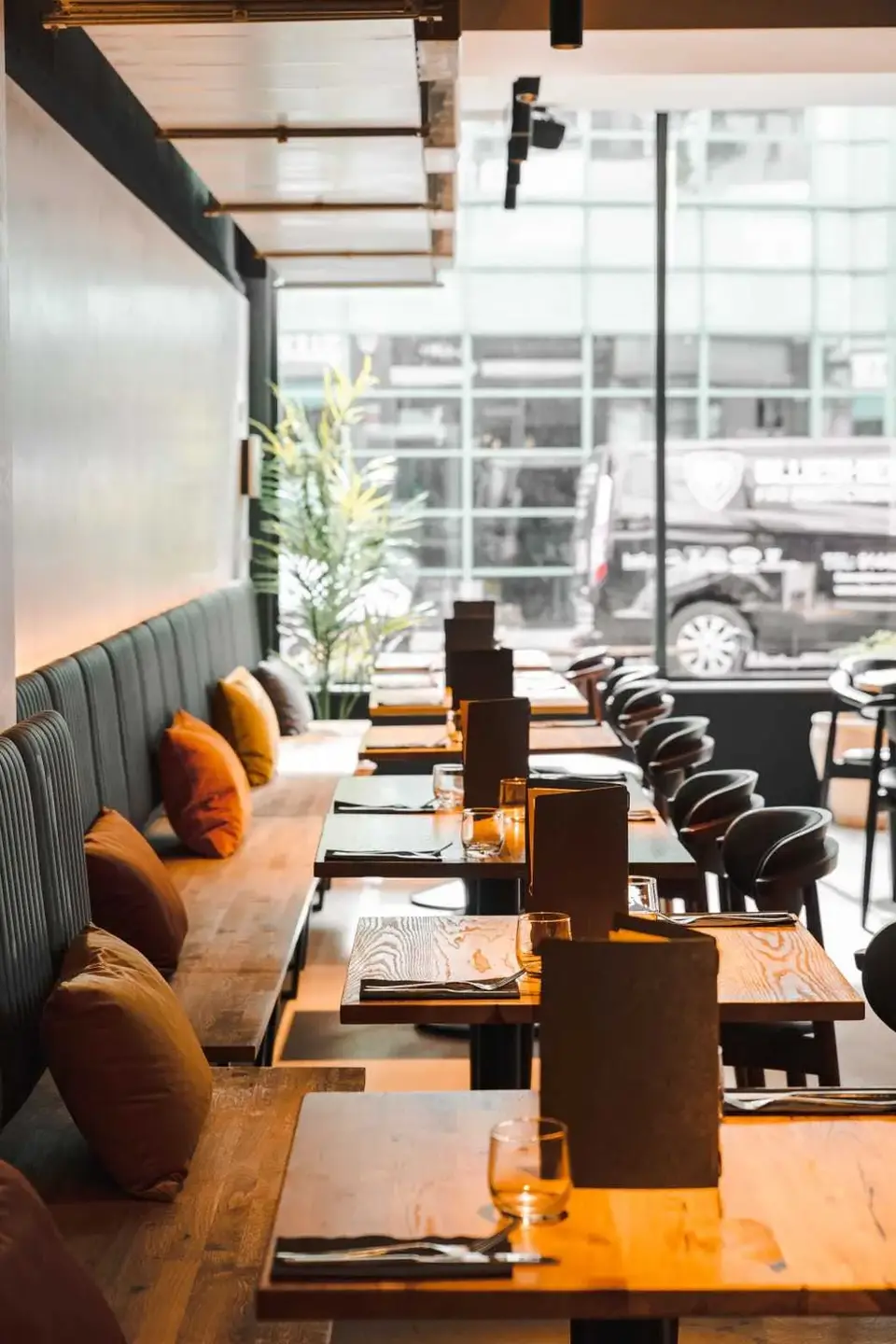 Stylish hospitality design using leather banquette seating. Interior design service