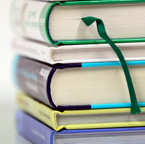 a stack of books on a white background