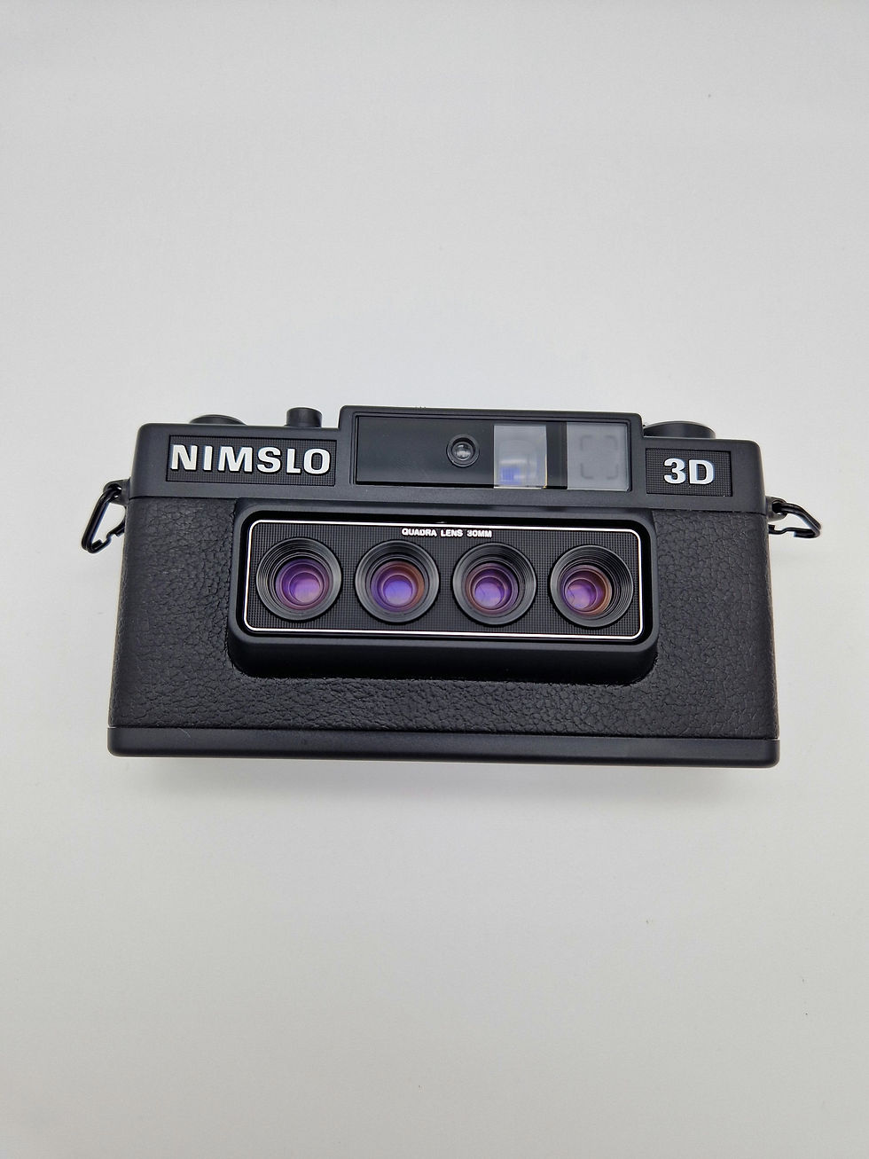 Thumbnail: Nimslo 3D 35mm film camera. 
