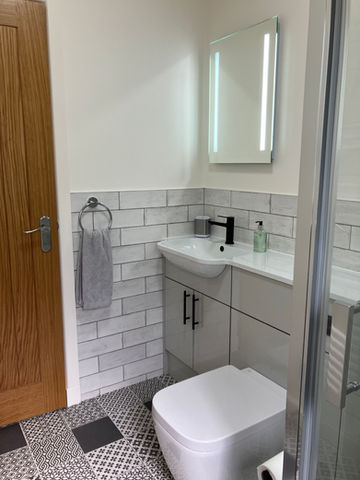 Modern, spacious shower room.