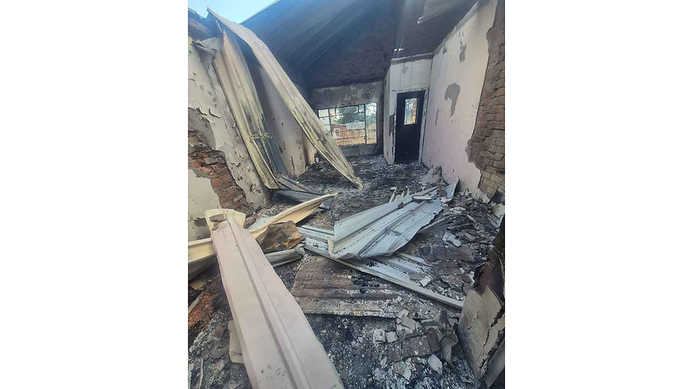 Destroyed property following overnight fire in Sisombe