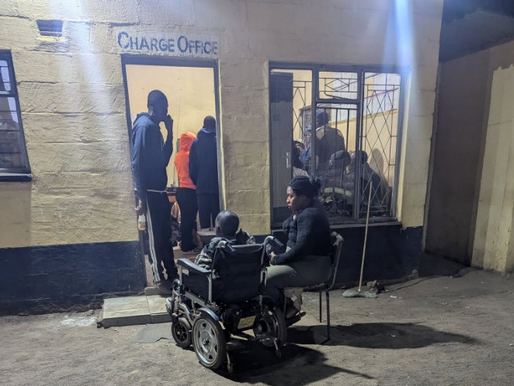 Musician Greatman during a police questioning.