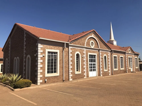 Church service inside an enclosed, soundproof building — churches soundproofed suburbs