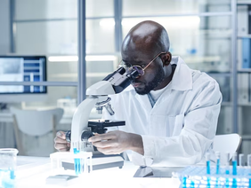 “African laboratory scientists analysing pathogen samples”