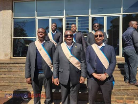 St Joseph's Guild members wearing ceremonial sashes and uniforms.