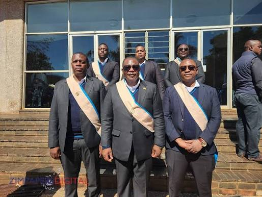 St Joseph's Guild members wearing ceremonial sashes and uniforms.