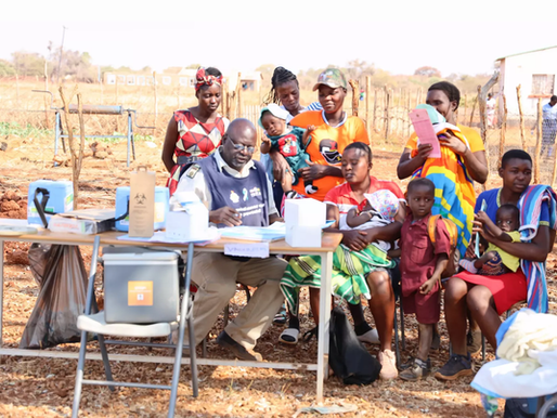 Community outreach team speaking with young women — targeted awareness for HIV prevention