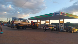 Fuel station near residential houses showing buffer requirement