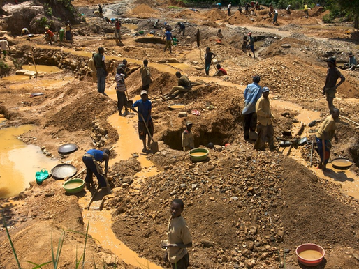 Small-scale gold miners processing ore in Zimbabwe
