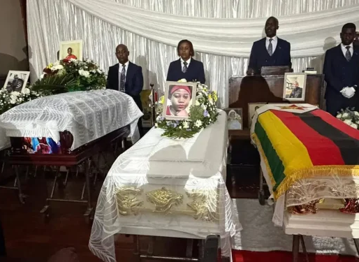 Three coffins of the deceased family members