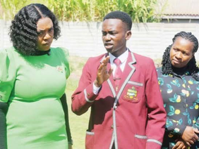 Minister Tatenda Mavetera speaking at a technology education event.