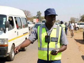 Zimbabwe traffic police conduct roadside breathalyser test