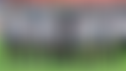 Barbourfields Stadium matchday — crowd and pitch at Barbourfields Stadium