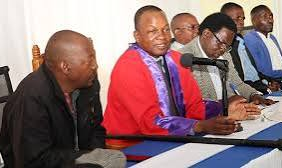 Chief Mutasa presiding over a traditional court session.