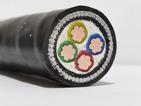 Close‑up of 120mm x 4‑core armoured cable on the ground — recovered copper cable evidence