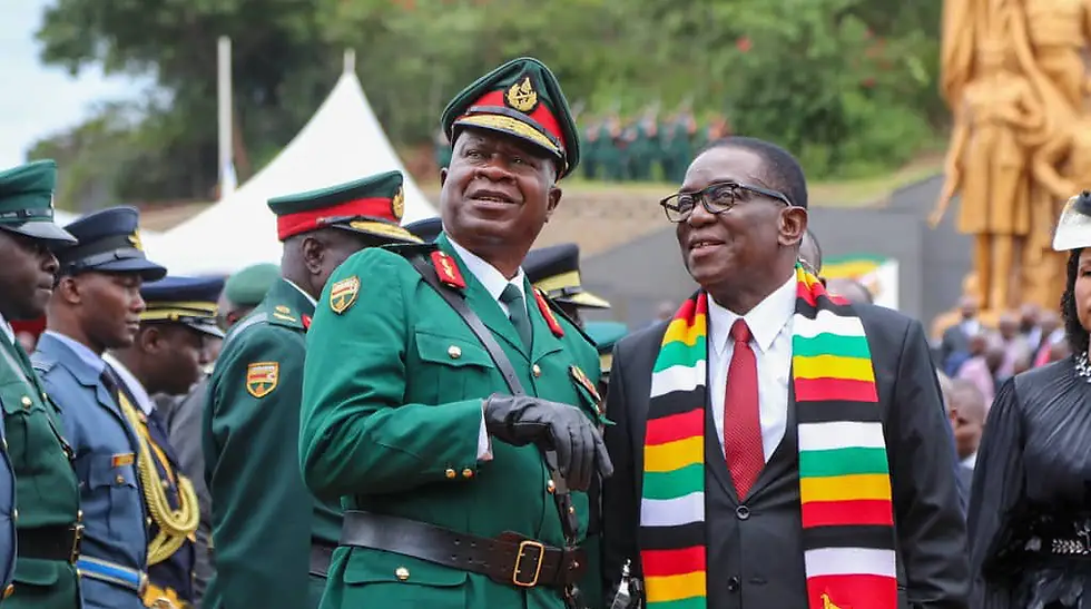 A file photo of General Phillip Valerio Sibanda in full military regalia alongside President Mnangagwa.