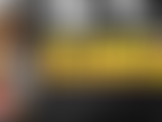 Learnmore Jonasi performing stand-up comedy