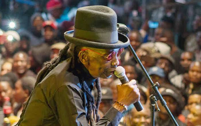 Thomas Mapfumo performing on stage.
