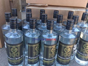 Bottles of suspected counterfeit Highlanders African Gin seized during a police raid.