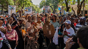 Community members gathered during anti-violence campaign in South Africa