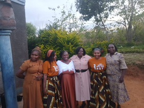 Zimbabwe Prisons and Correctional Service (ZPCS) officers standing alongside family members during a traditional Ndau marriage event.