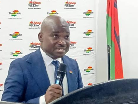 Deputy Minister Davis Marapira at a public event.