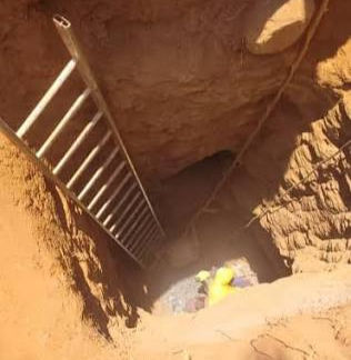 Illegal mining shaft discovered in a residential area.