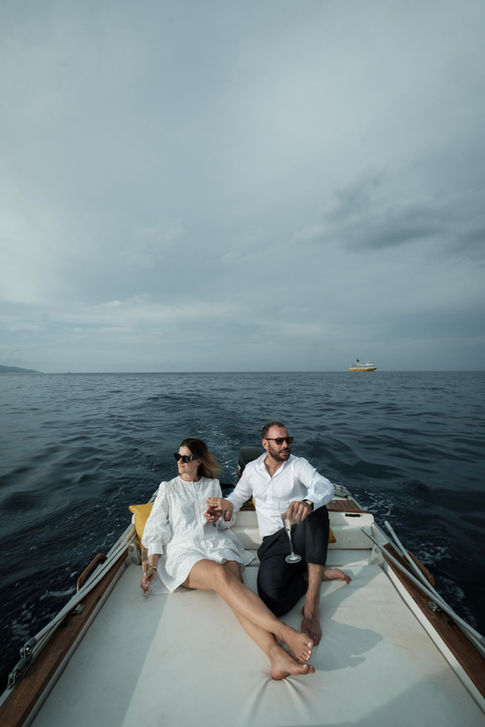 Destination wedding photographer Italy – editorial couple portrait aboard a boat, Bastia, Corsica