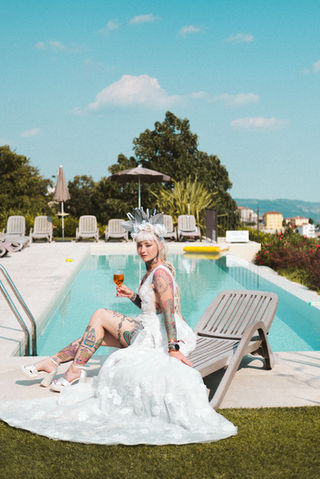 Luxury destination wedding photographer – bridal portrait at a private villa pool, Lake Garda style