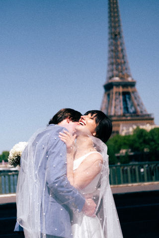 Destination wedding photographer Paris – editorial couple portrait at the Eiffel Tower