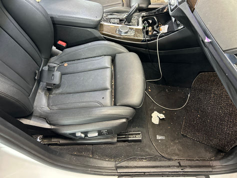 Dirty BMW 5 Series interior before a full detail at 5Boro Auto Detailing in Queens NY