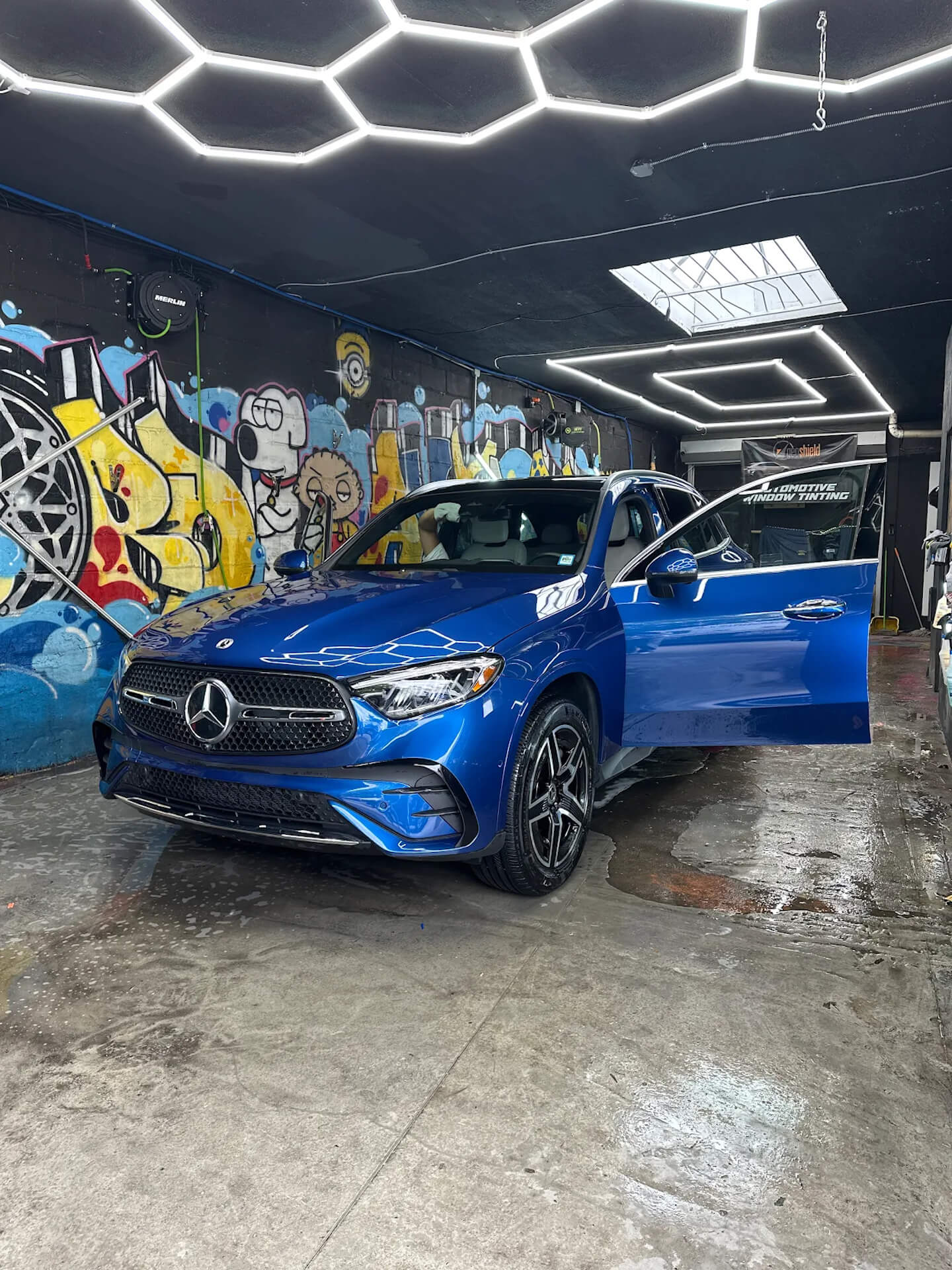 Blue Mercedes in the 5Boro detailing bay