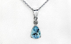 14KW Pear Shaped Aquamarine Pendant with Diamond Accent