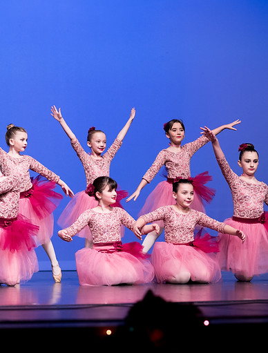 ballet-dancers-end-pose-in-pink