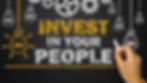 Invest in your people on chalk board