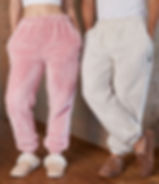 Vegan Unisex Fluffy Fleece Joggers shown in natural and pink from Vegan Happy Clothing with subtle vegan logo