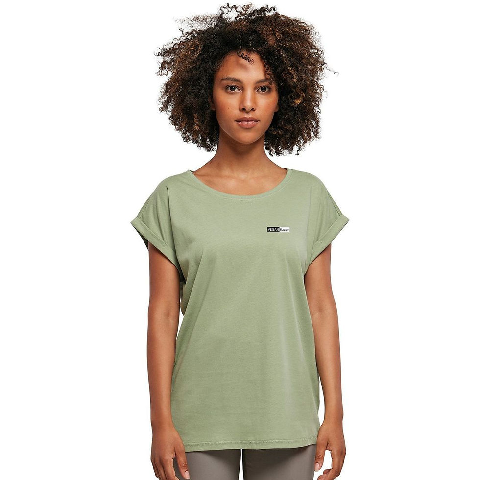 Vegan Women's Extended Shoulder Tee in soft green on female model with subtle vegan logo from Vegan Happy Clothing