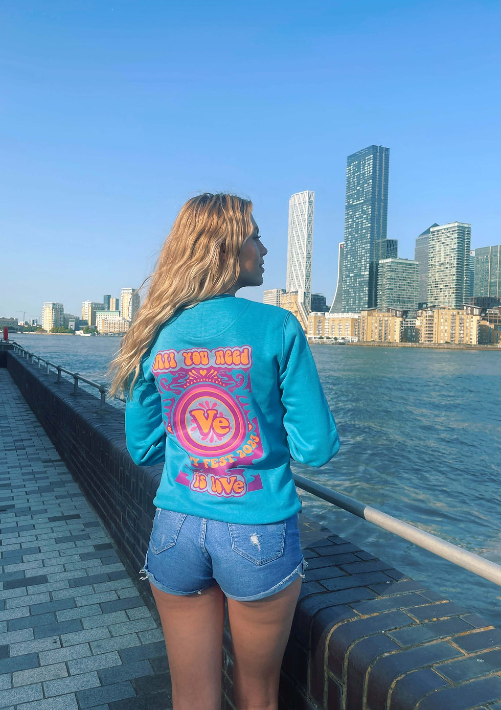 Vegan Unisex 'All You Need Is Love' Changer Sweatshirt, rear view as modelled by Antonia Whillans in London