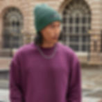 Vegan Oversize Cuff Beanie shown marine green on male model from Vegan Happy Clothing with subtle vegan logo