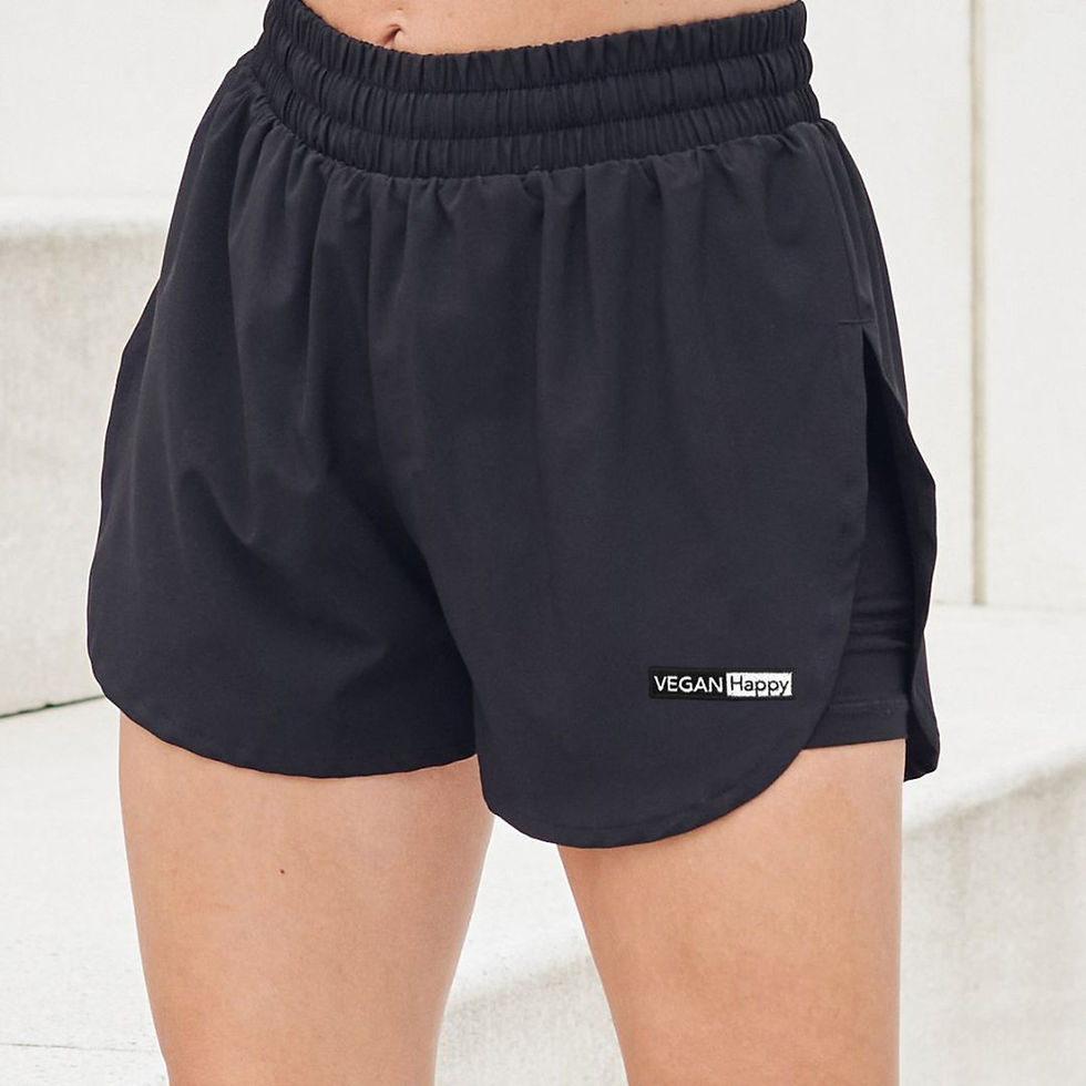 Thumbnail: Vegan Women's Double Layer Sports Shorts in black with subtle vegan logo to the hem from Vegan Happy Clothing