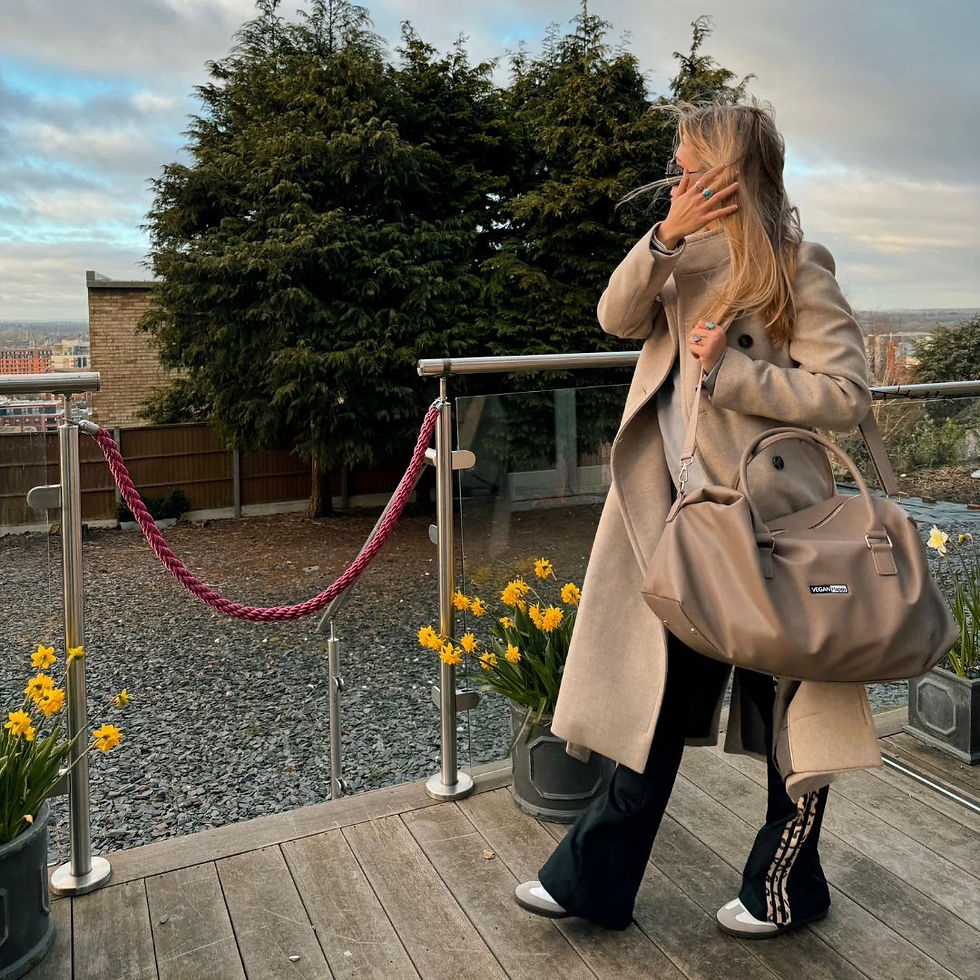 Thumbnail: Vegan Boutique Weekender as modelled by Antonia Whillans in taupe by Vegan Happy Clothing