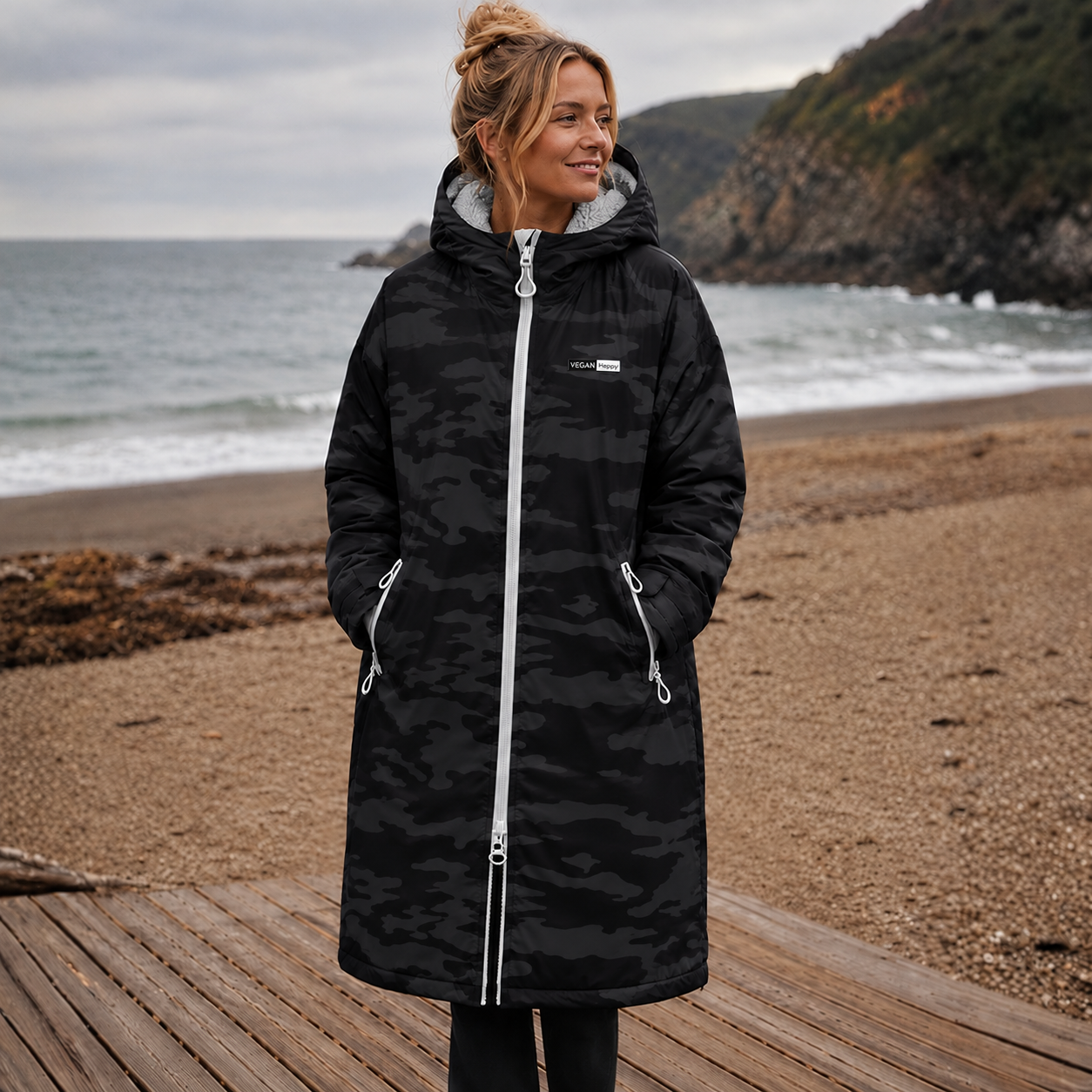 VEGAN Happy TriDri® All-seasons waterproof changing robe in black camo from Vegan Happy Clothing with subtle vegan logo