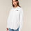 Thumbnail: Vegan Stella Styler Women's Cotton Shirt from Vegan Happy Clothing in white with subtle vegan logo