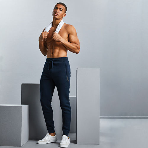 Thumbnail: Vegan men's joggers in 3 colours with subtle vegan logo near pocket from Vegan Happy Clothing