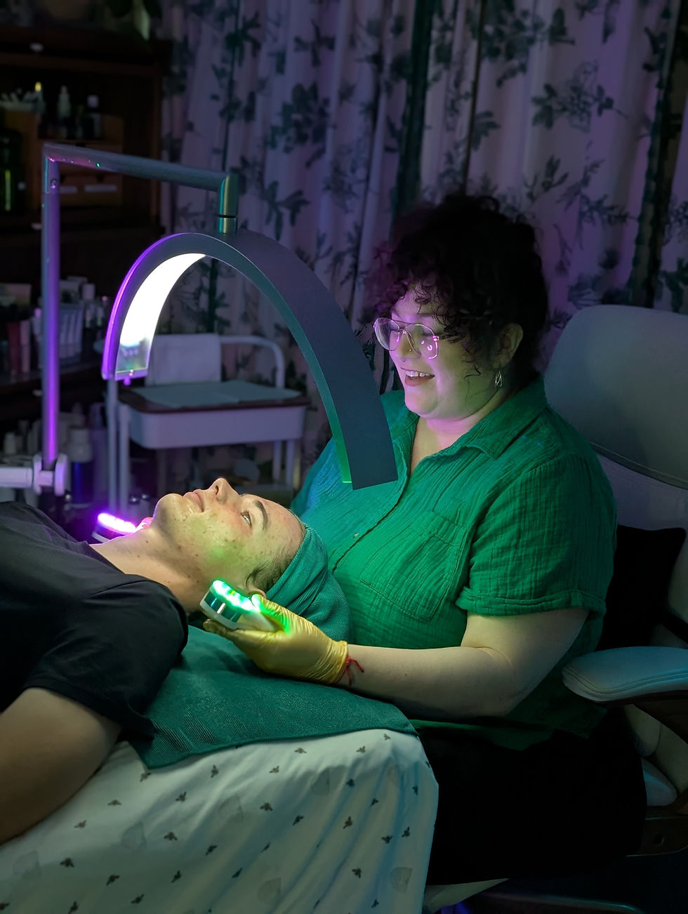 A client about to receive LED therapy during a facial
