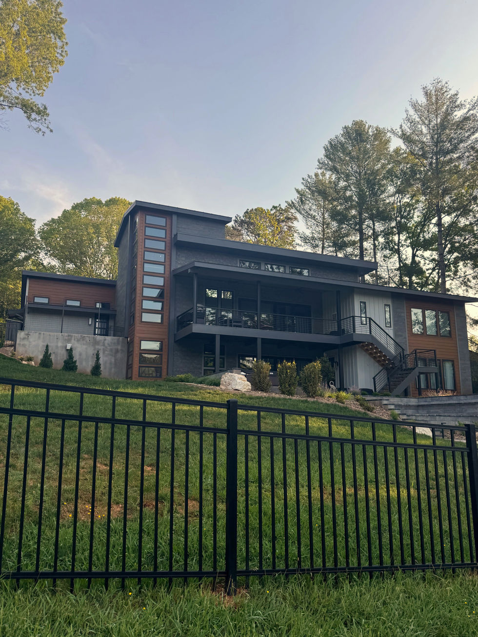 exterior of a painted modernist grey and brown home