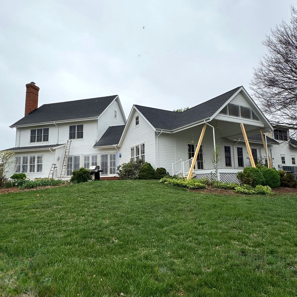 front/side exterior of a home after being painted white