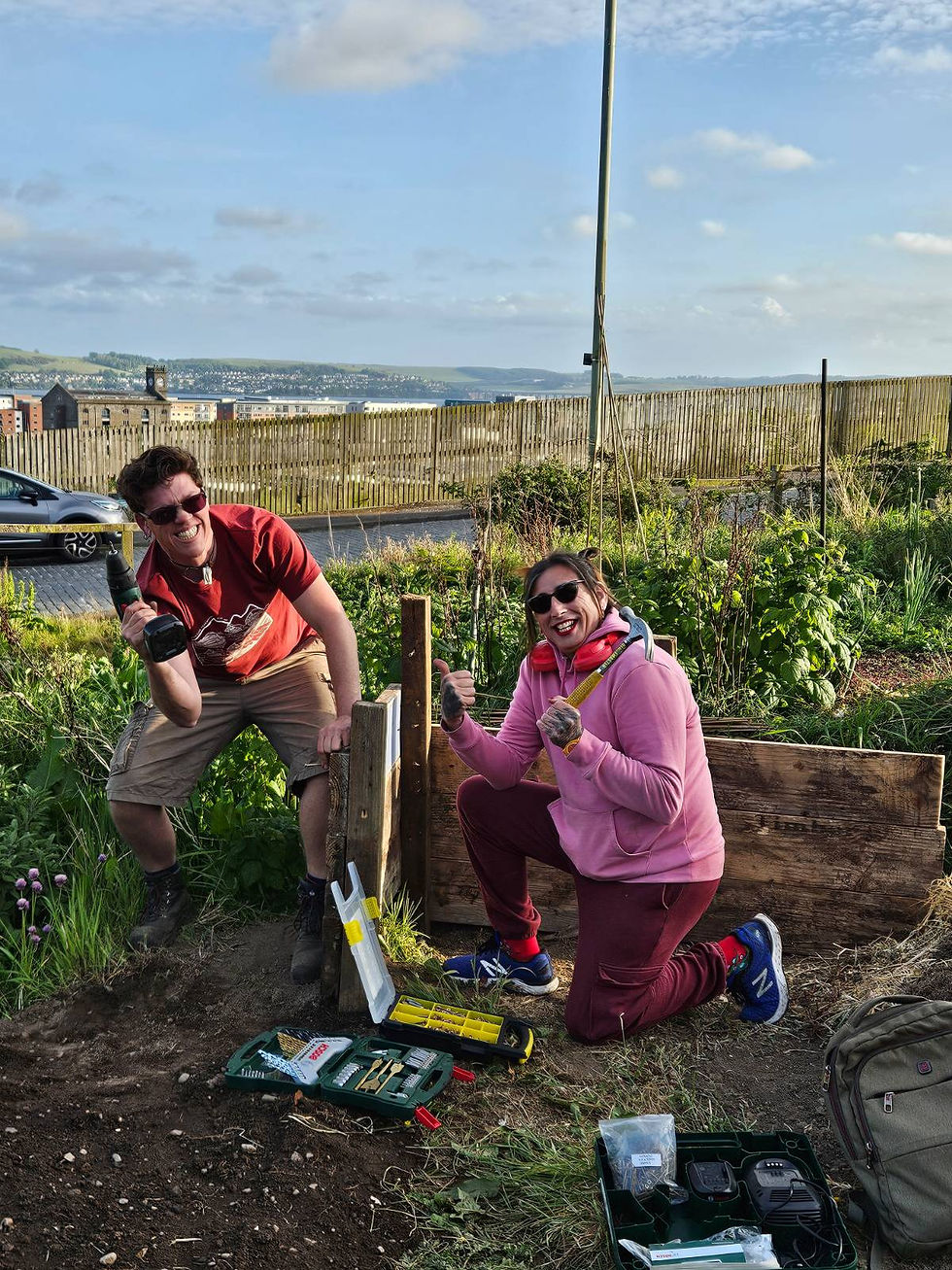 Glamorously building botch job compost bays with reclaimed wood