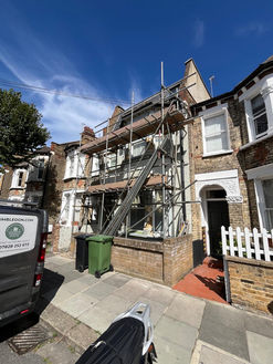 Exterior painting in progress on a Victorian terrace — PK Decorating Wimbledon on site