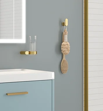 Gold bathroom accessories paired with light blue bathroom vanity unit 